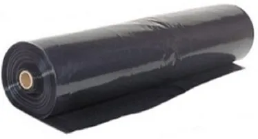 A roll of black fabric on top of a table.